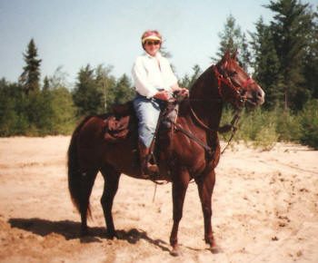 Mme Denise Gélineau, cavalière