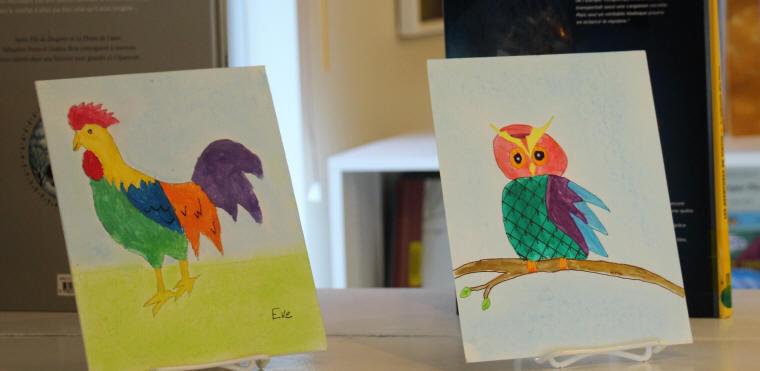 Dessins d'enfants, un coq et un hibou