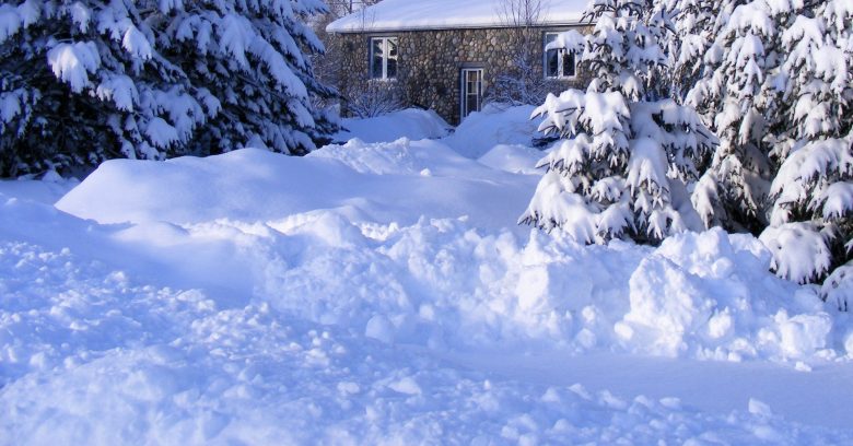 Maison sous la neige